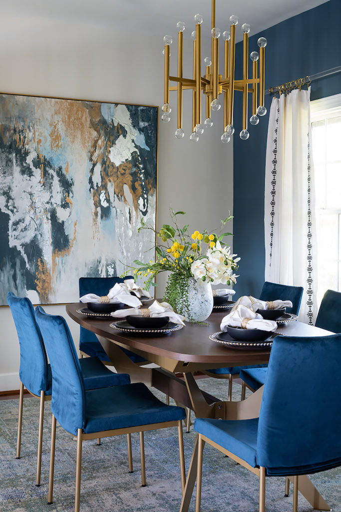 This is a small dining area in a waterfront home, so a coastal color palette was a natural choice.