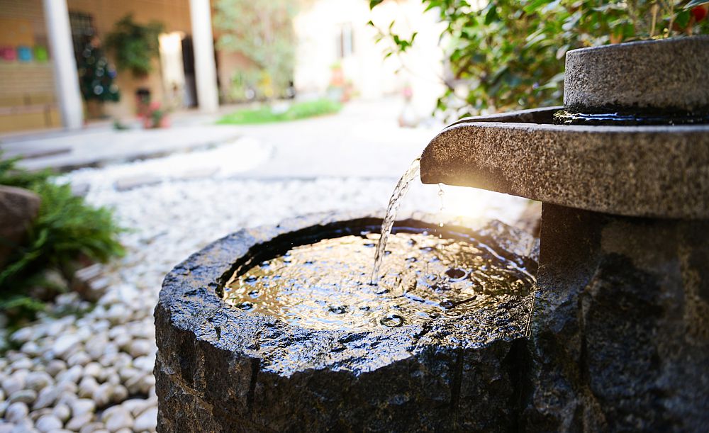 Incorporate a water feature into your patio or backyard for a relaxing ambience.