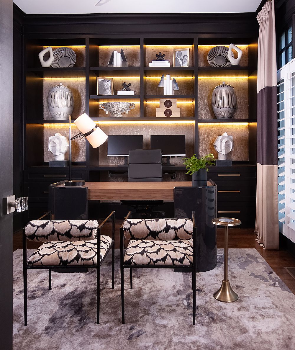Custom cabinetry with plentiful lighting feature in this home office design.